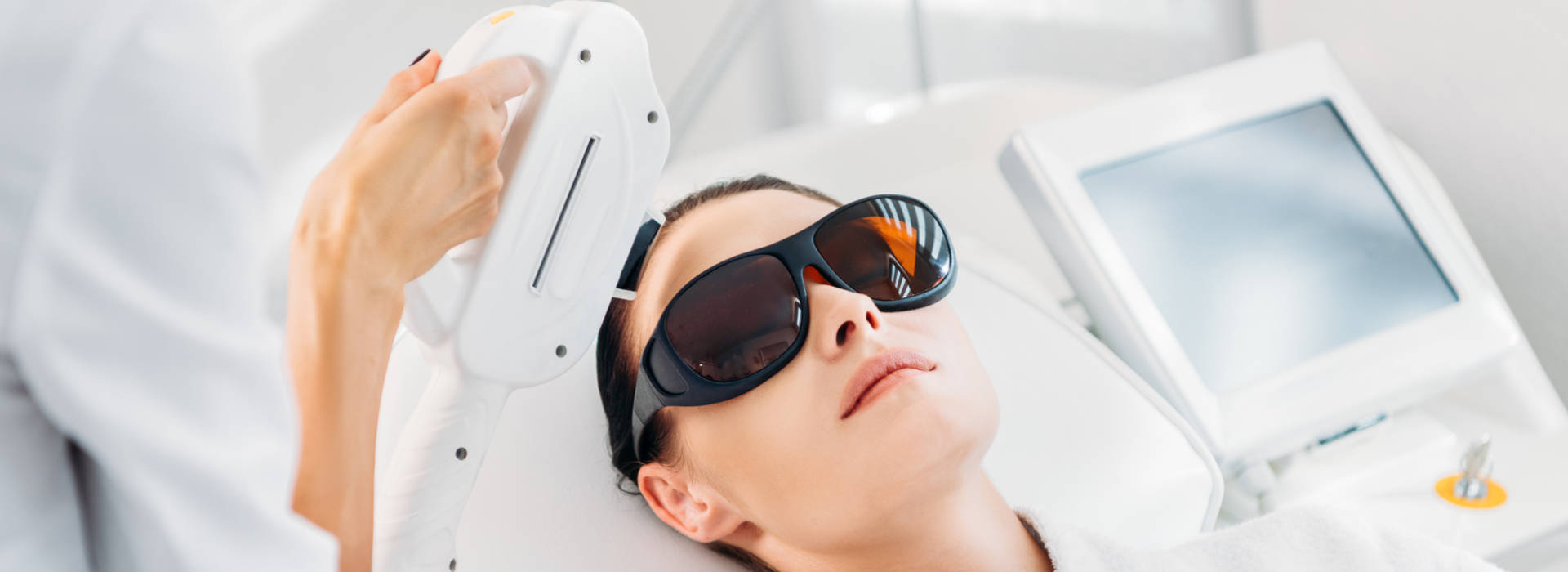 A beautiful woman is having laser treatments.